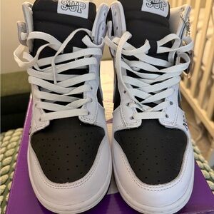 Supreme Black and White High-Top Sneakers